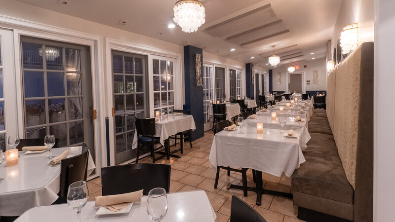 Side dining room with set tables